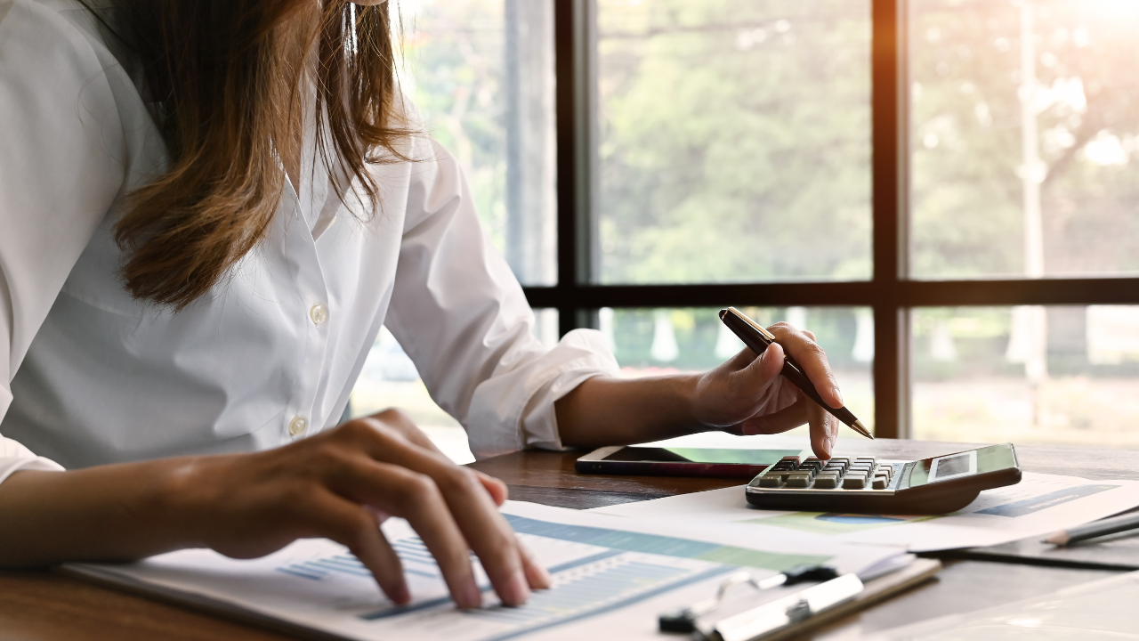 woman calculating expenses and inflation